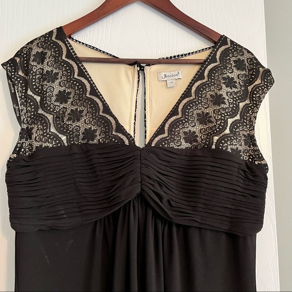 Black dress with lace and pleated top and bottom that flows. - Picture 3 of 4